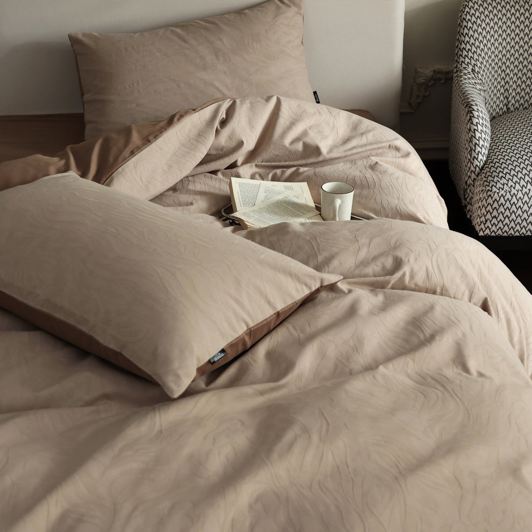 Luxurious year-round bedding set made from skin-friendly cotton blend with subtle wave texture and concealed hotel closure