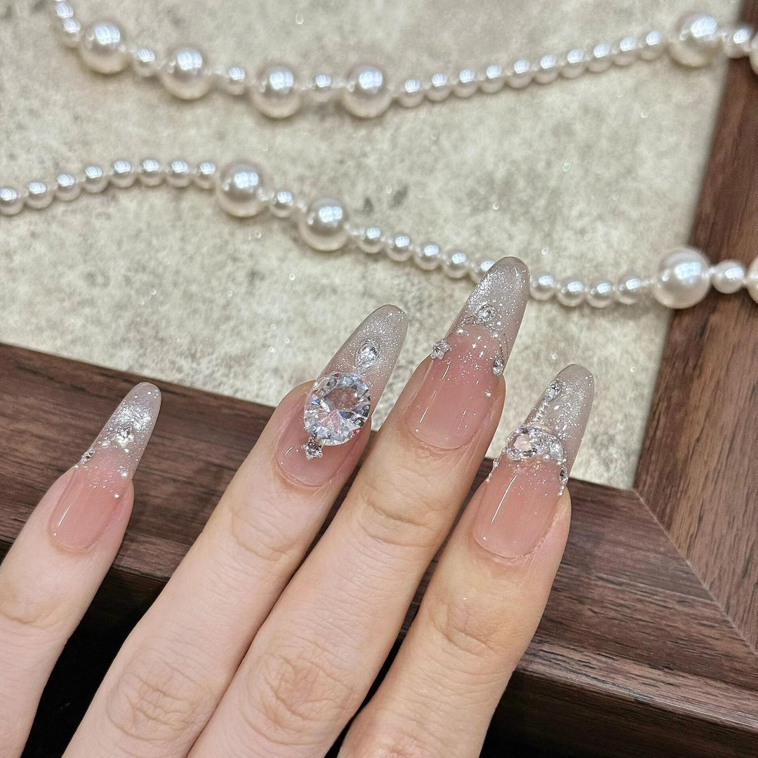 Artificial artificial nails with luxurious glitter and rhinestone design Stornfield