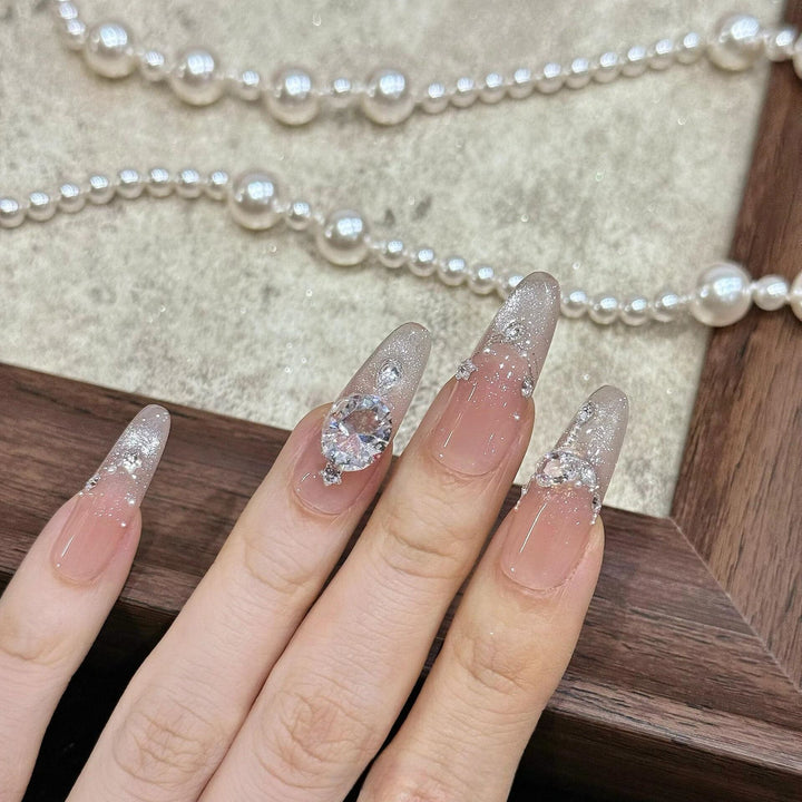 Artificial artificial nails with luxurious glitter and rhinestone design Stornfield