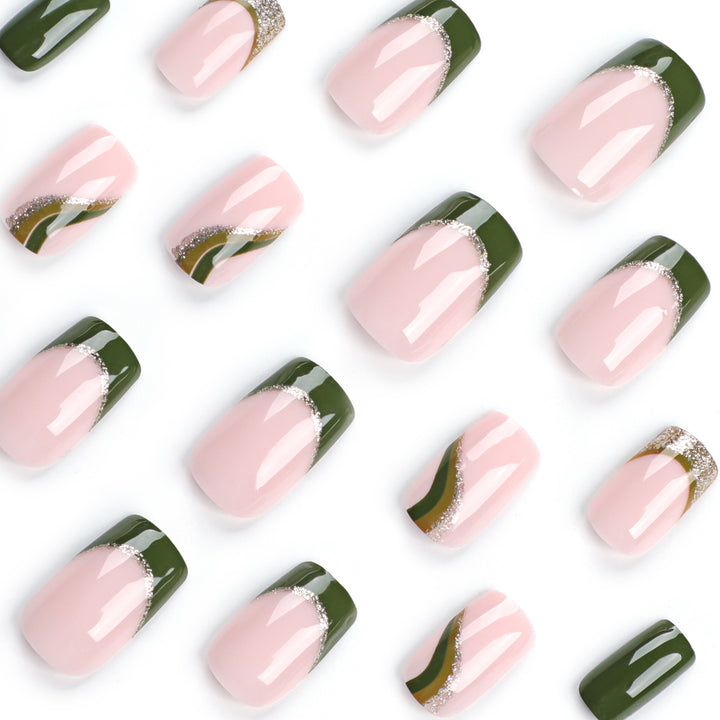 Artful nail extensions with golden accents and elegant design Stornfield