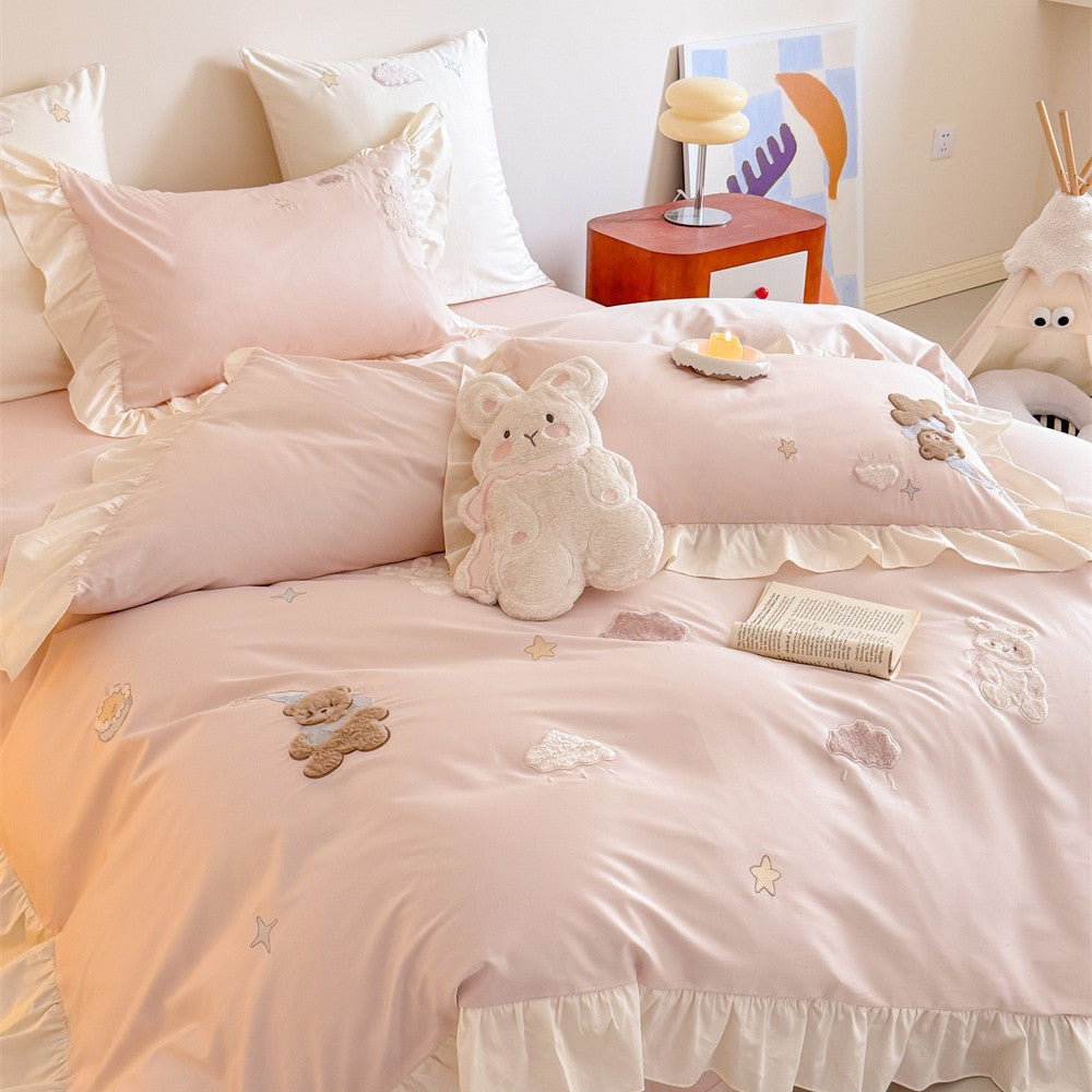 Romantic ruffle bedding set with embroidered teddy bear and cloud appliqués