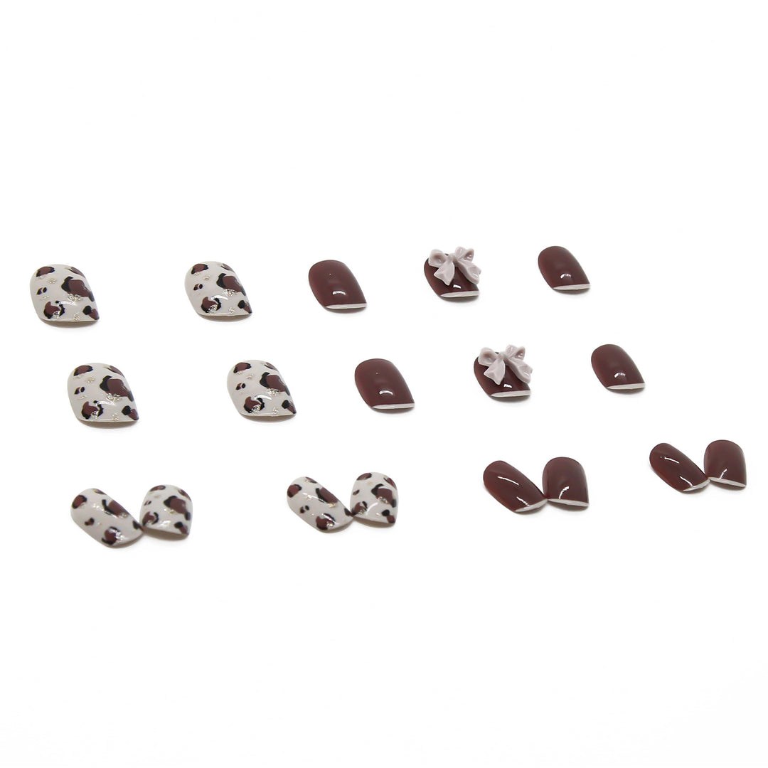 Artful nail tips with elegant foil decorations Stornfield