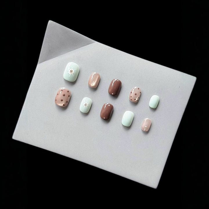 Decorative Press-On Nail Set with Unique Artistic Designs