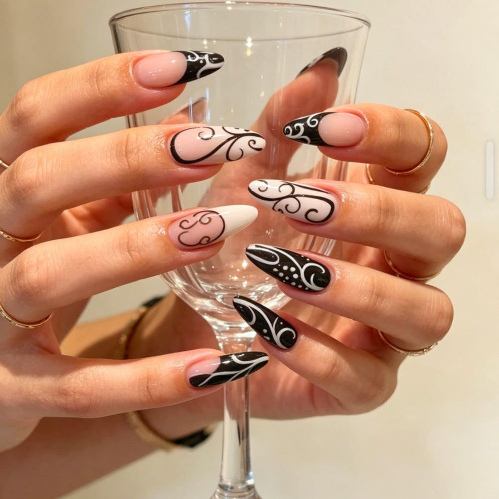Artificial nails with modern black and white design Stornfield