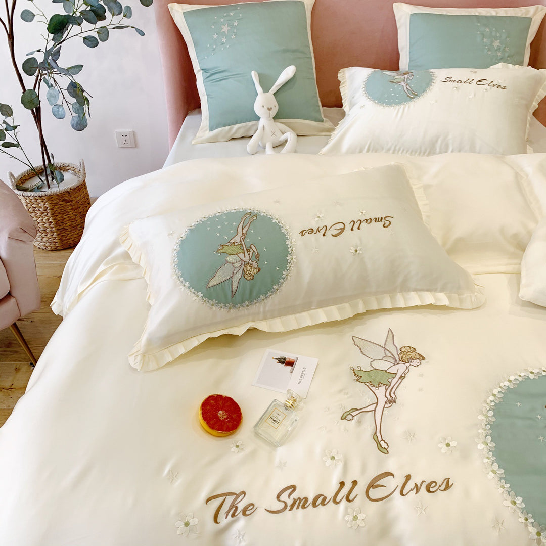 Satin bedding set with fairy embroidery, ruffled hem and decorative pillowcases