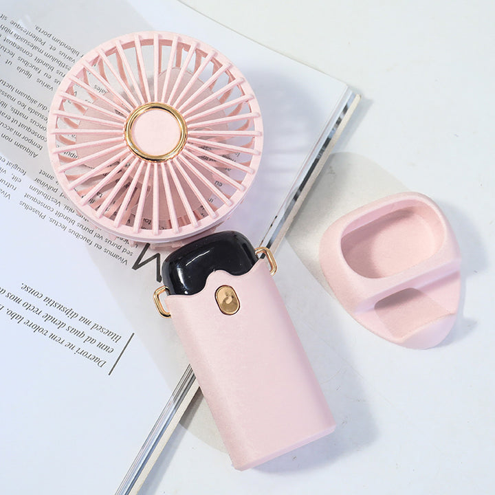 Women's Portable Hand Fan with Integrated Spray Function and USB Charging Option Stornfield