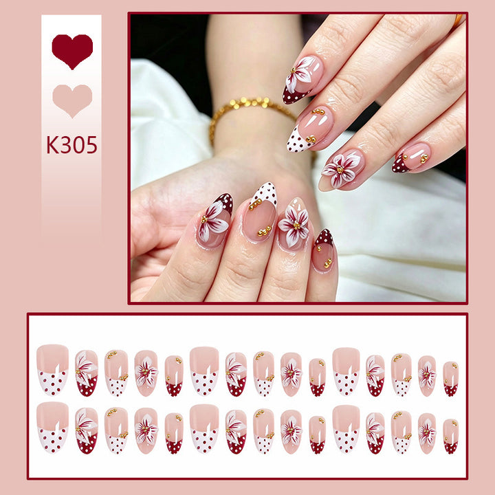Artificial nail set with floral design and golden accents Stornfield