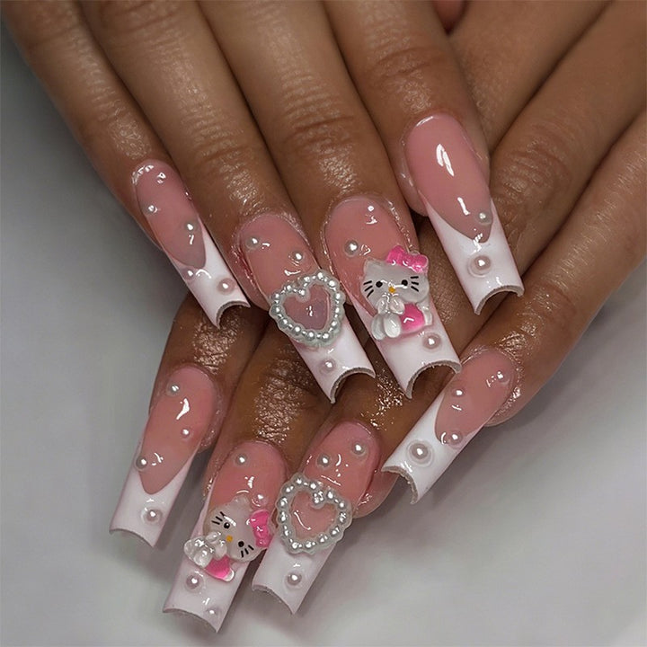 Glamorous artificial nail set with sparkling rhinestone embellishments and creative animal designs Stornfield