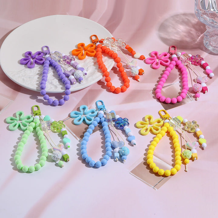 Playful keychain with flower and butterfly details Stornfield