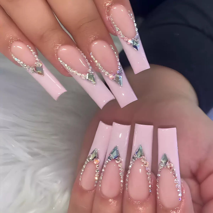 Glamorous artificial nails with sparkling rhinestone embellishments Stornfield