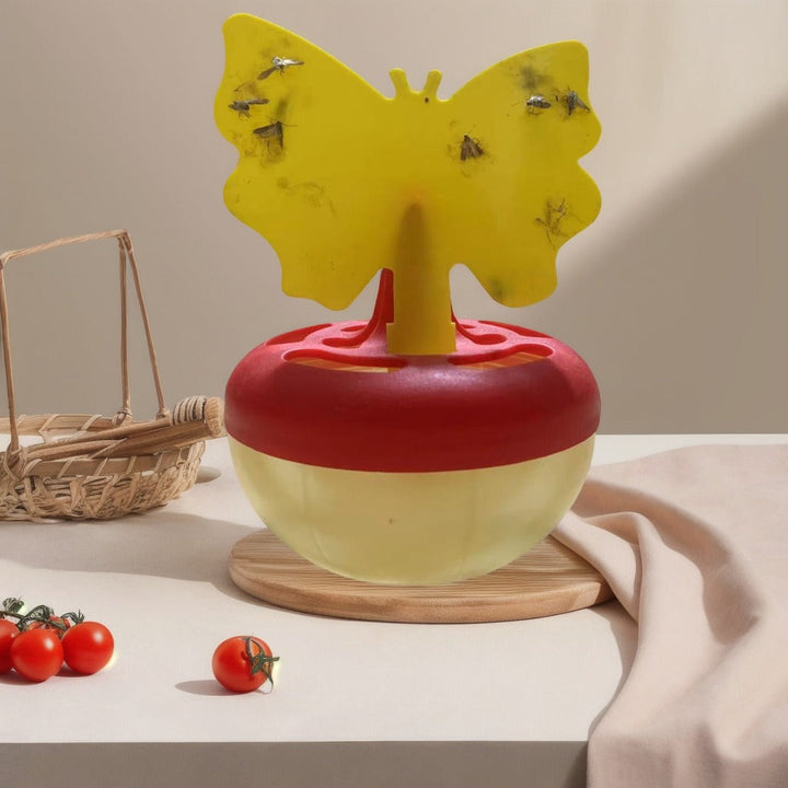 Butterfly-shaped sticky insect trap with refillable liquid reservoir and reusable base Stornfield
