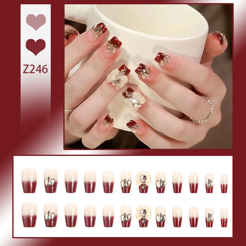 Artificial nails with glamorous floral decorations Stornfield