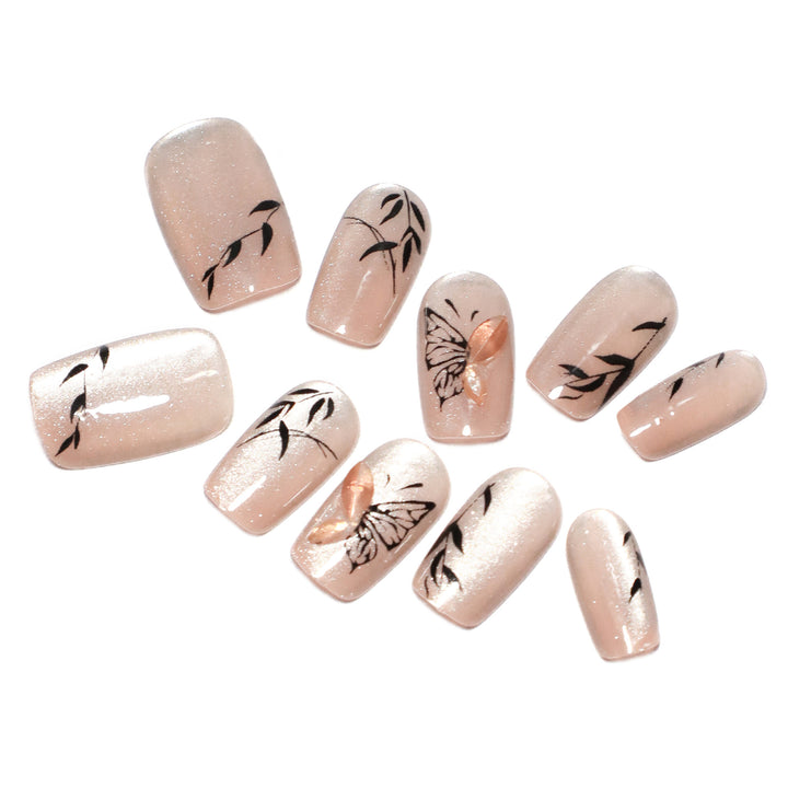 Artificial nail extensions with floral butterfly design Stornfield