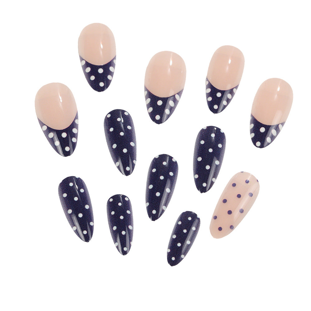 Artificial nails in modern polka dot design Stornfield
