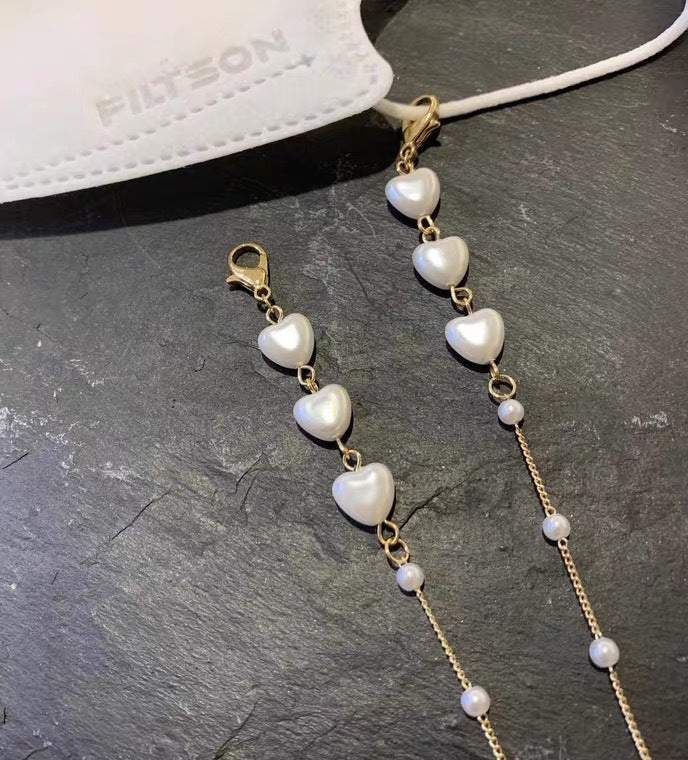 Stylish jewelry band with heart-shaped beads Stornfield