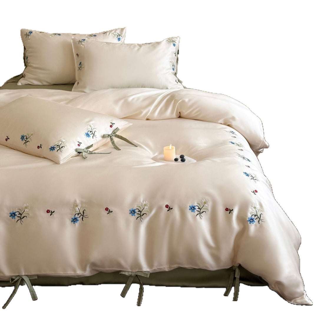 Luxurious satin bedding with floral embroidery and bow closure