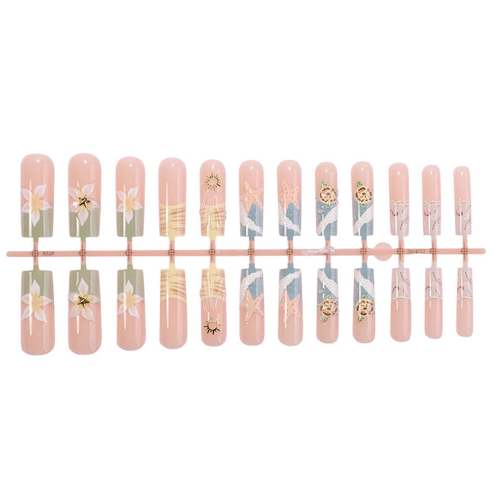 Creative acrylic nail set with floral and maritime accents Stornfield