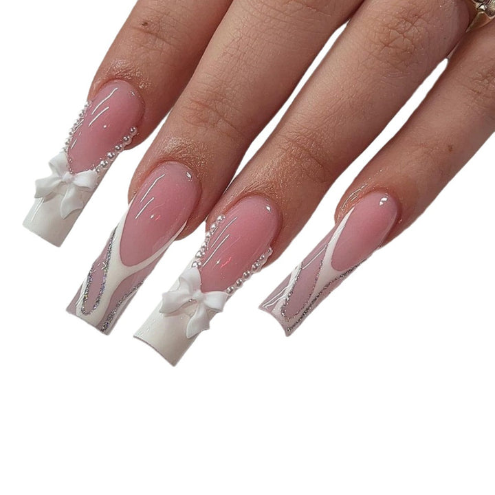 Decorative Long Coffin Nail Extensions with Bow Accents Stornfield
