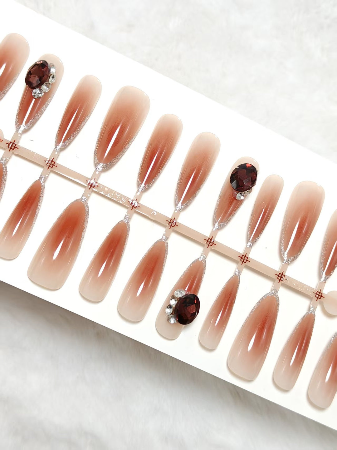 Elegant Artificial Nails with Shimmering Gradient and Sparkling Accents Stornfield