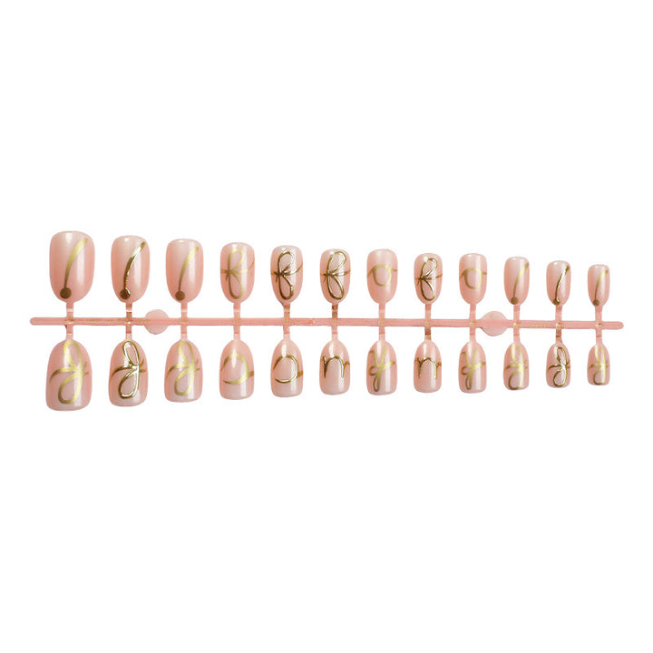 Elegant Press-On Nail Art Set with Stylish Gold Accents Stornfield