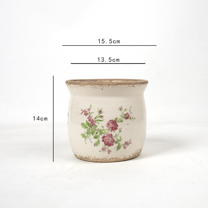 Decorative ceramic plant container with artistic design Stornfield