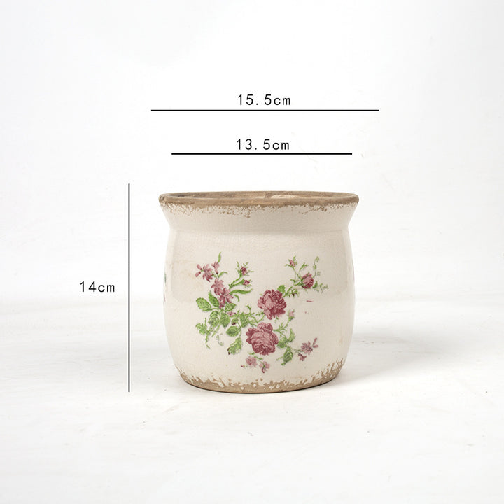 Decorative ceramic plant container with artistic design Stornfield