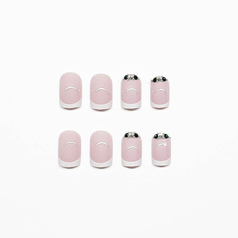 Art nail set with elegant French design and glittering accents Stornfield