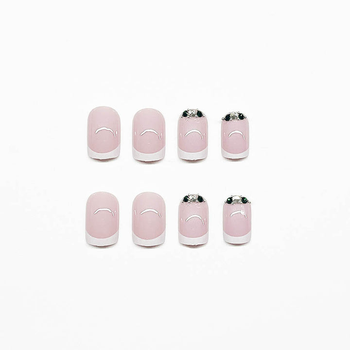 Art nail set with elegant French design and glittering accents Stornfield