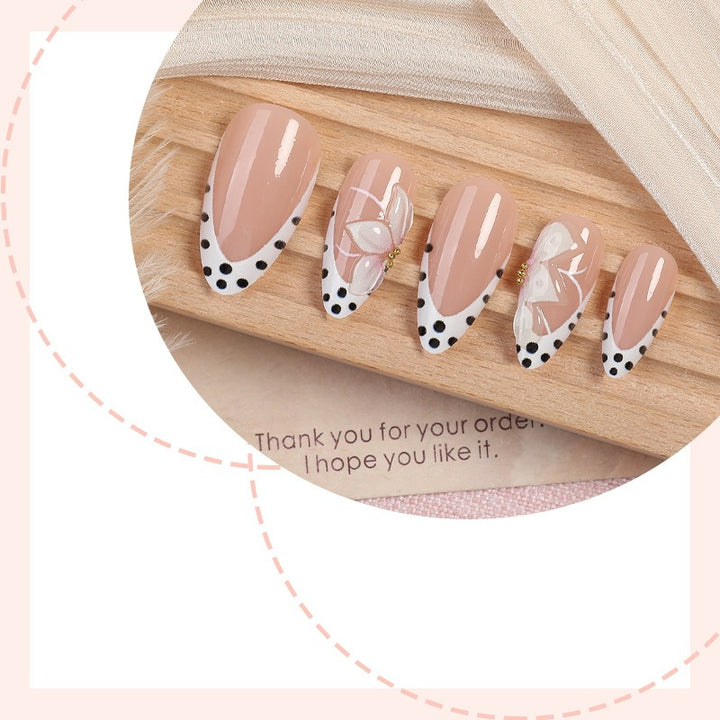 Artificial nail set with elegant flower and dot designs Stornfield