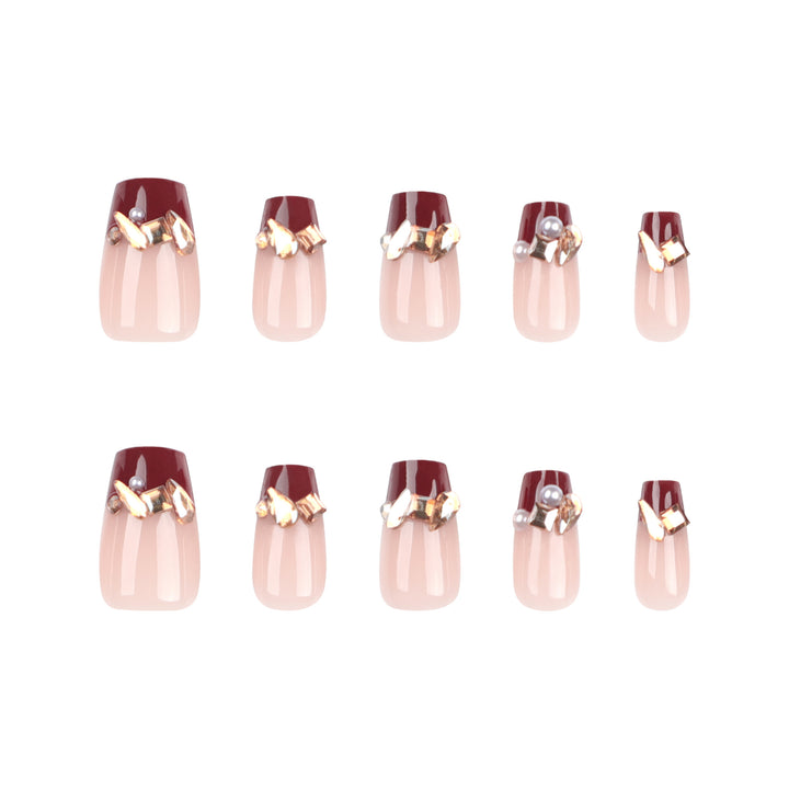 Artful nail extensions with glitter and jewelry embellishments Stornfield