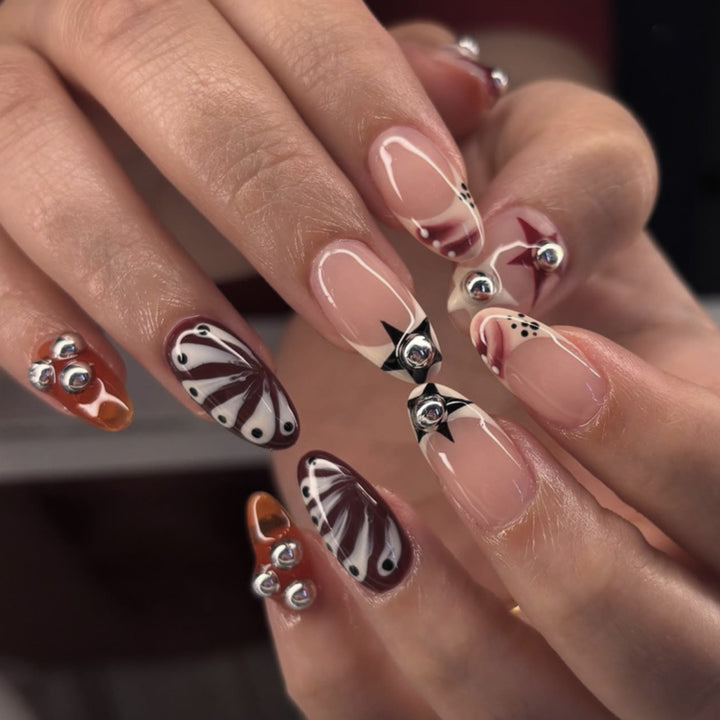 Artistic acrylic nails with creative 3D decorations Stornfield