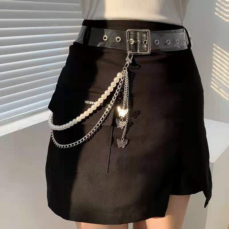 Fashionable belt with pearl and chain pendants Stornfield