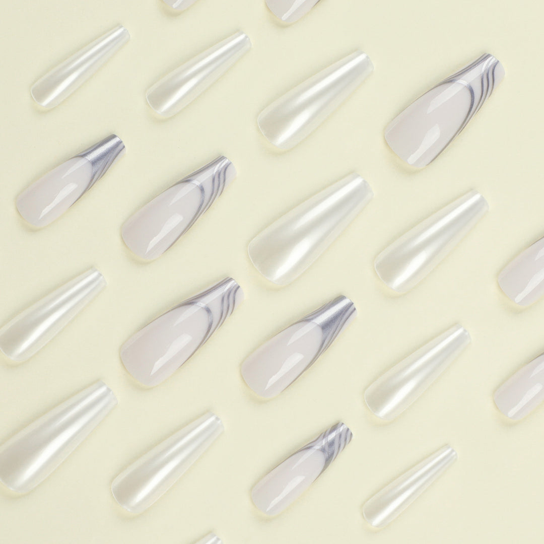Artificial nail extensions with marbled design Stornfield
