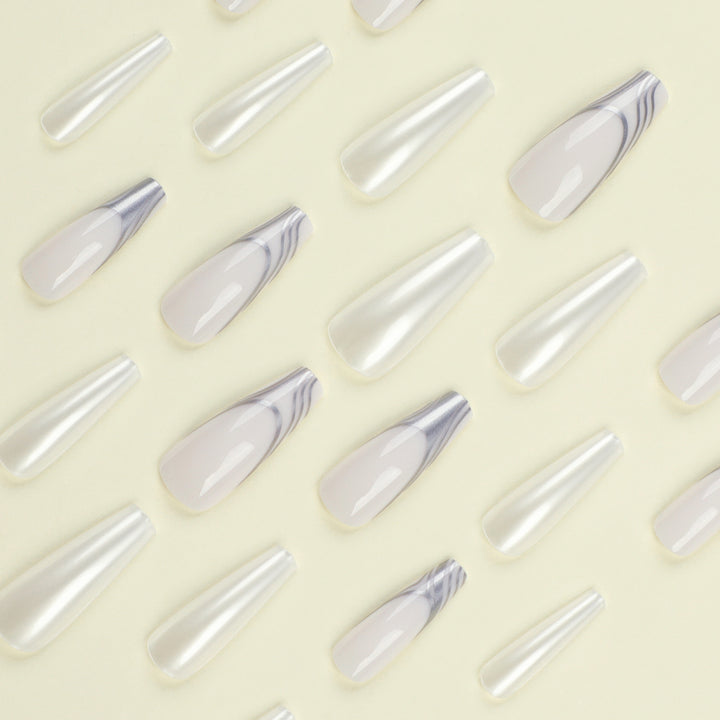 Artificial nail extensions with marbled design Stornfield