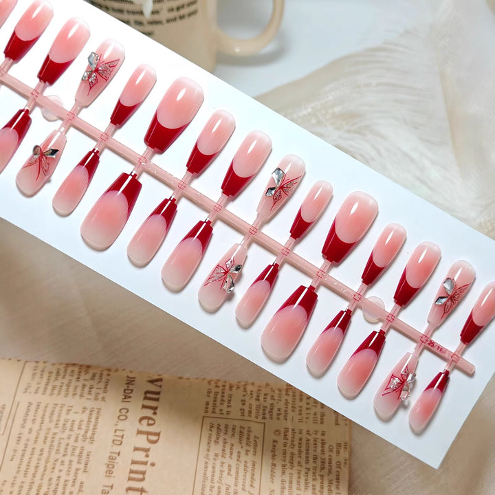 Artificial nails with elegant floral design and glitter accents Stornfield
