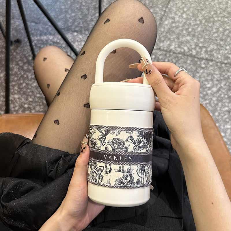 Women's stylish thermos cup with practical carrying handle Stornfield