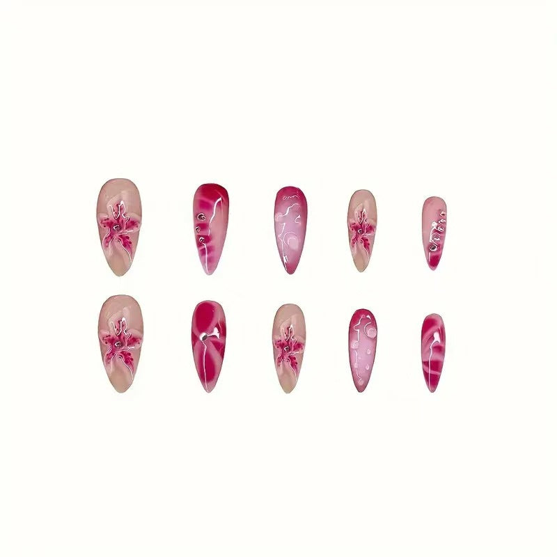 Artistic Stiletto Nail Enhancements with Intricate Floral Design Stornfield