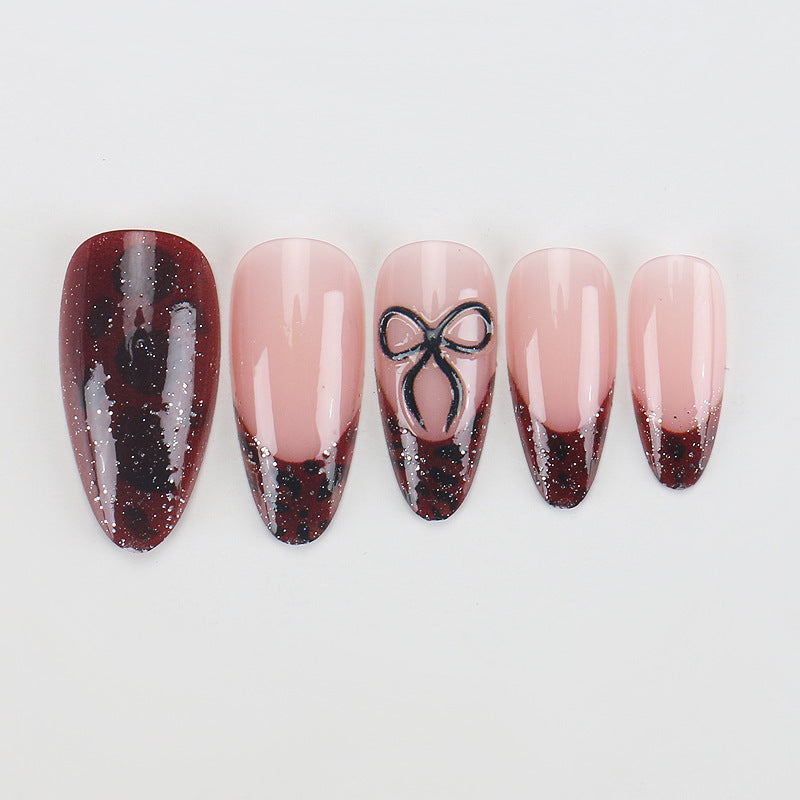 Artistic Stiletto Press-On Nails with Unique Black and Red Design Stornfield