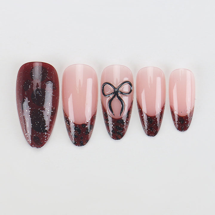 Artistic Stiletto Press-On Nails with Unique Black and Red Design Stornfield