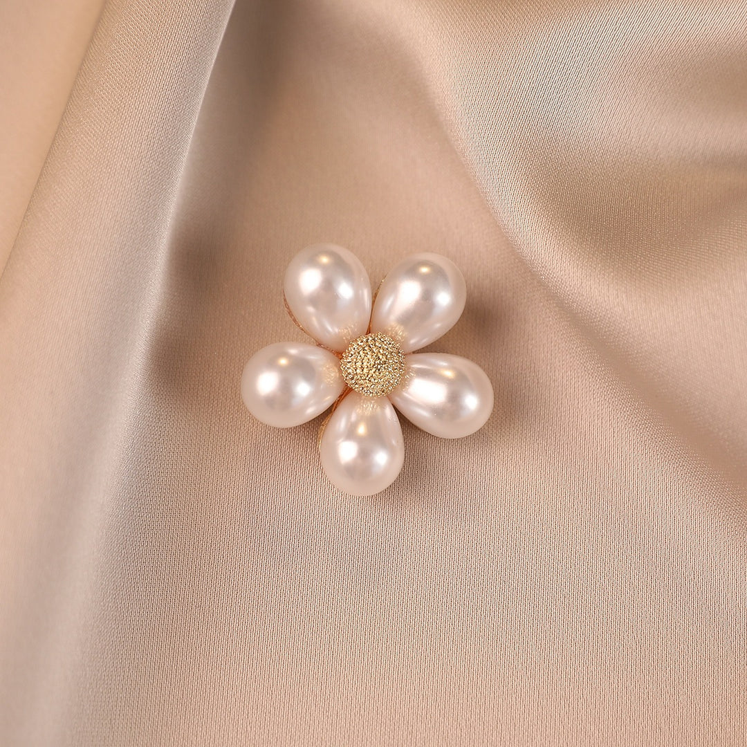 Elegant flower brooch with pearl accents Stornfield