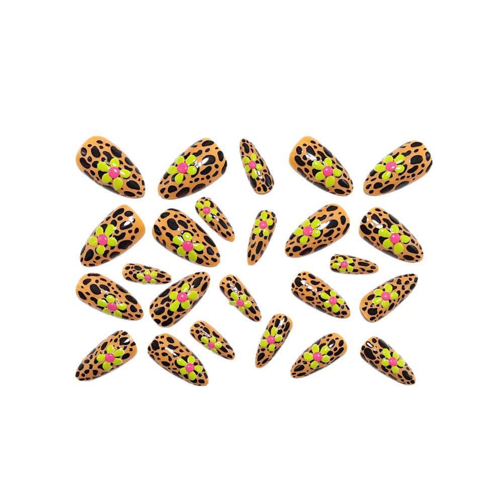 Artificial nails in modern animal patterns with floral accents Stornfield