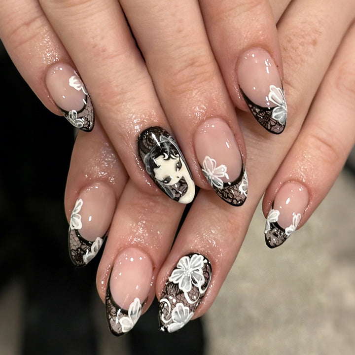 Artificial nail set with elegant tips and floral decorations Stornfield