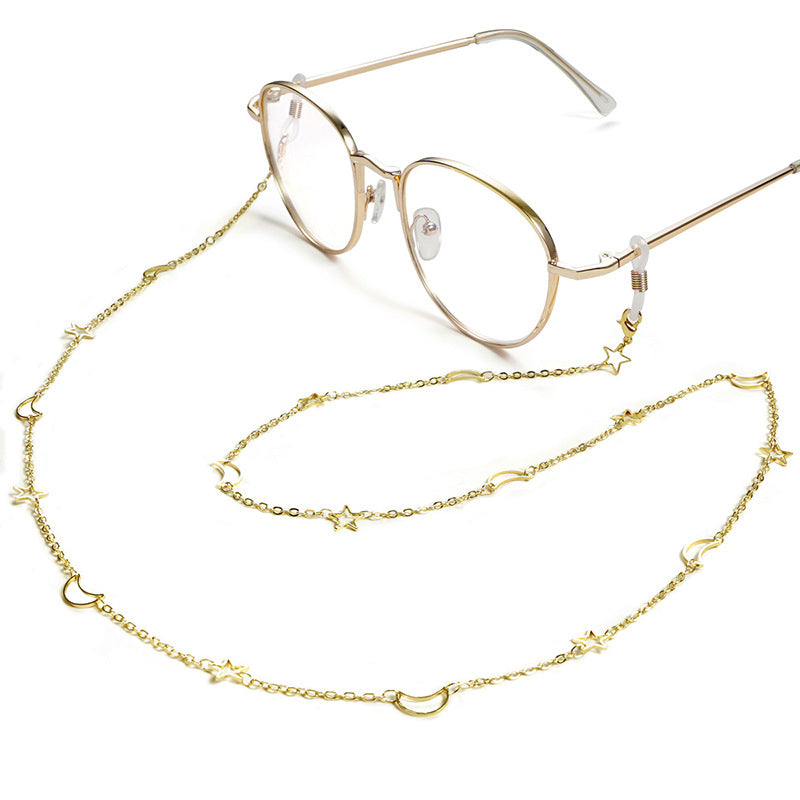 Fashionable glasses holder chain with star and moon motifs Stornfield
