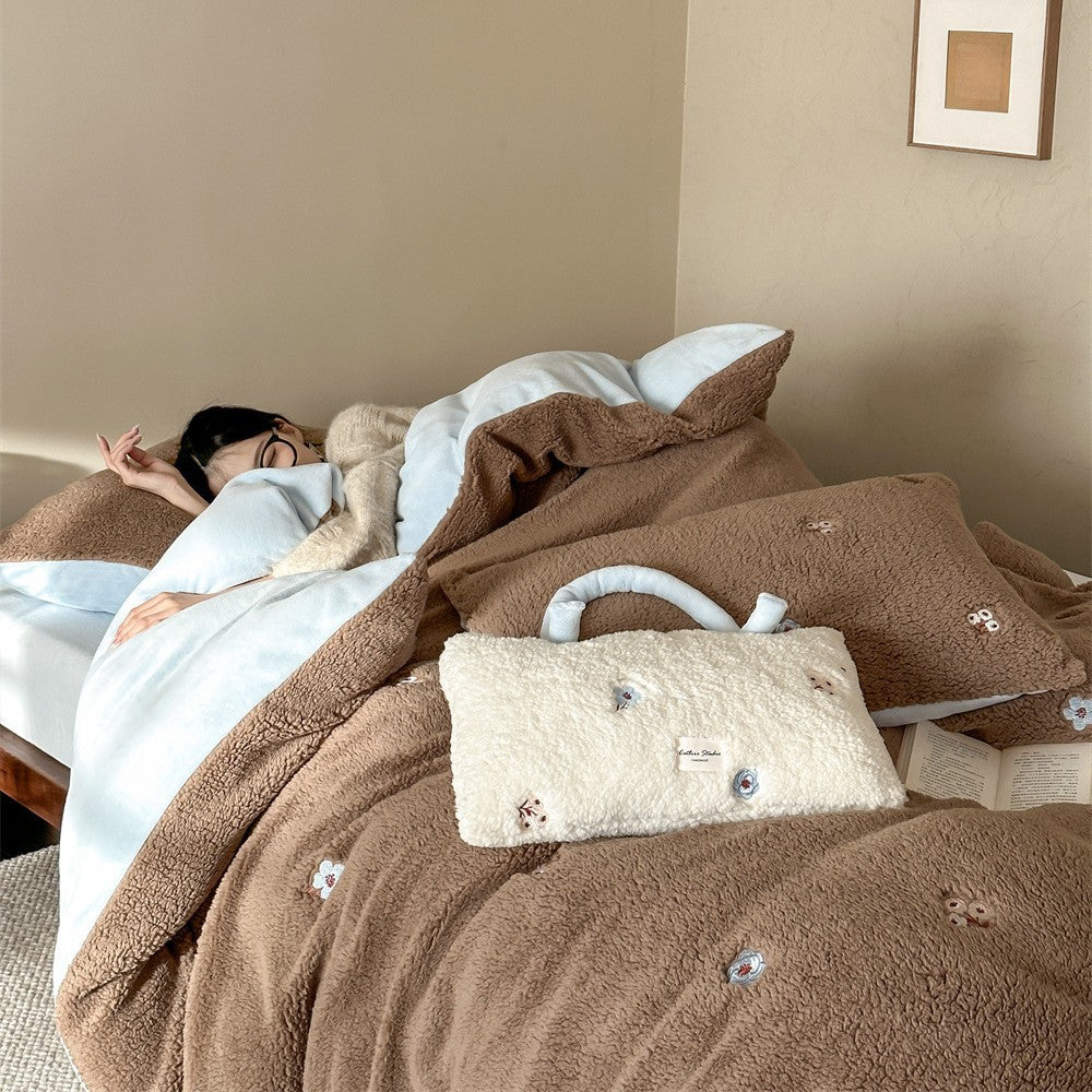 Sherpa bed blanket and reversible bed cover with embroidered flower appliqués