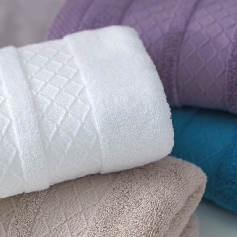 Large premium terry bath towel with decorative structure border