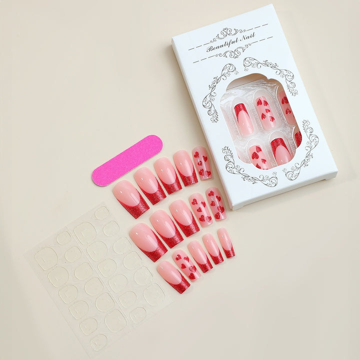 Acrylic nail set with glamorous heart designs and glitter accents Stornfield
