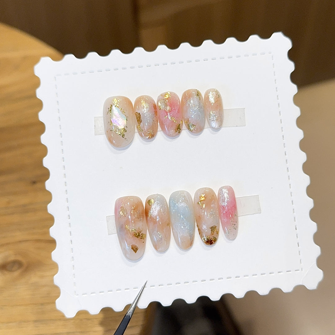 Artificial nails with glamorous metallic details and sparkling design Stornfield