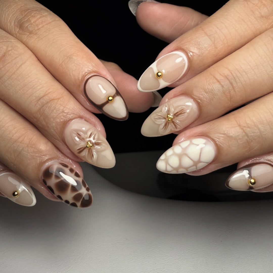 Artful Nail Extensions with Floral and Glitter Details Stornfield