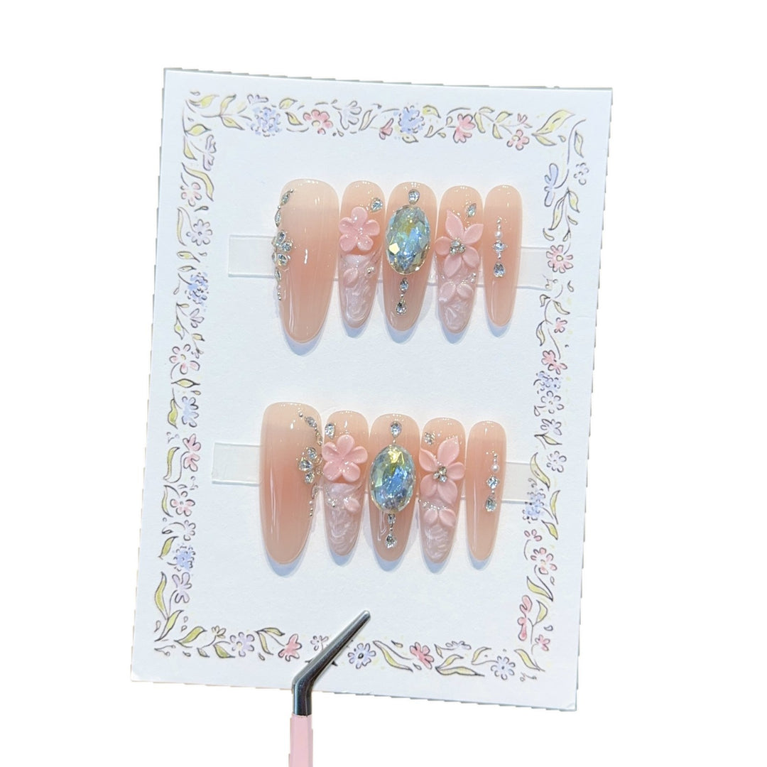 Artificial artificial nails with floral decorations and glitter details Stornfield