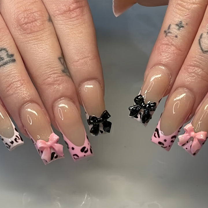 Decorative Press-On Nail Art with Bow Accents